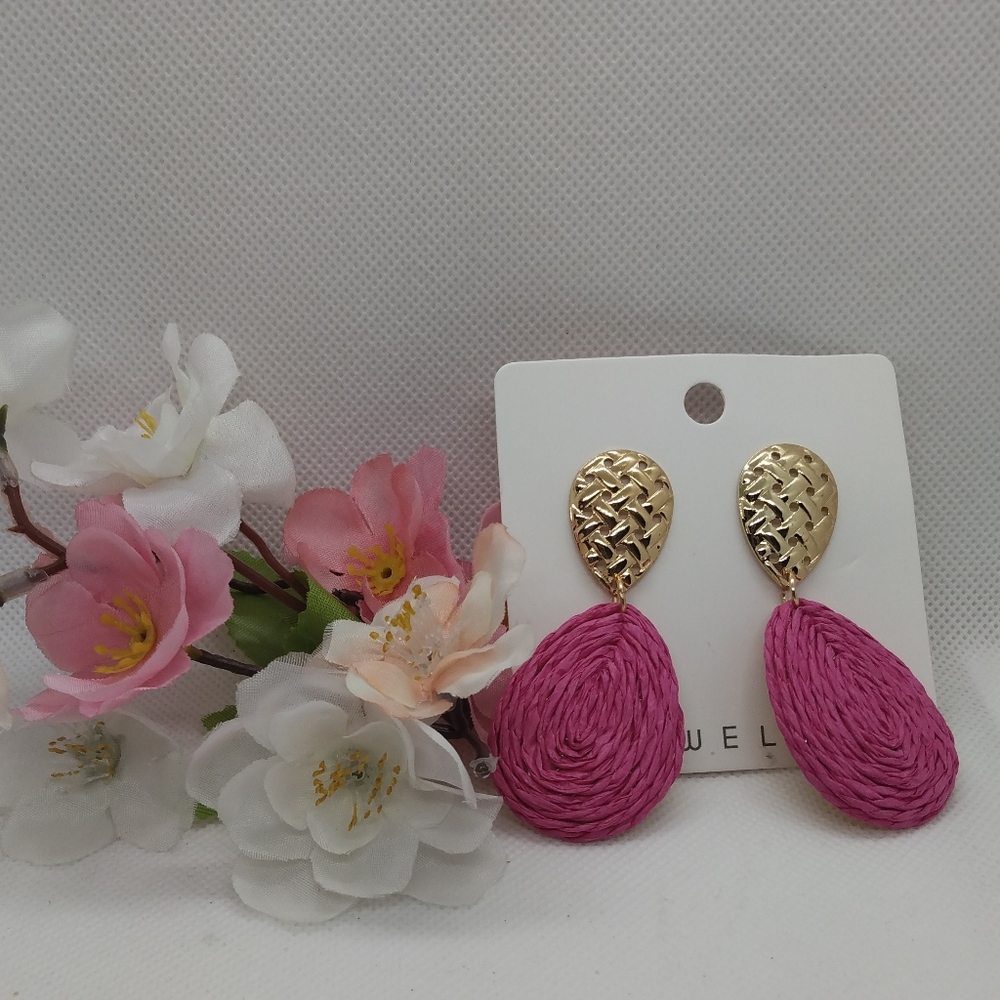 Unbranded fashion earrings with pink raffia. NOC